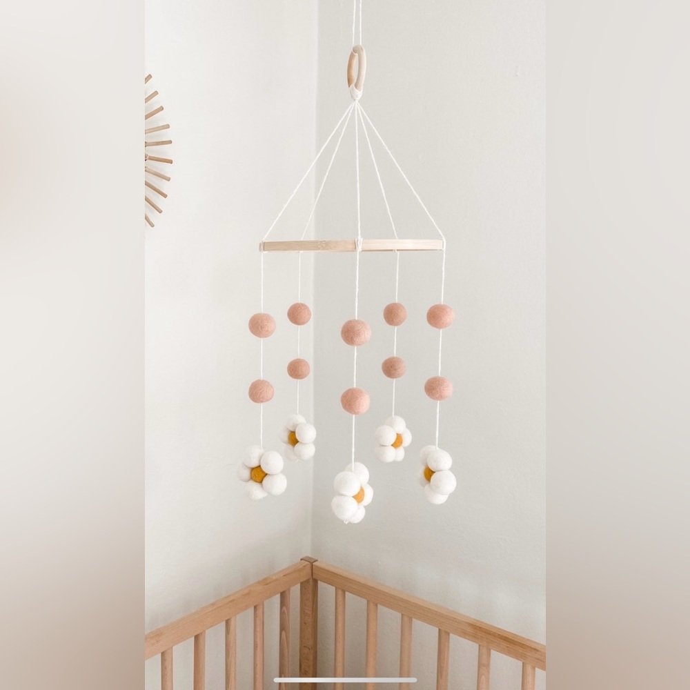 Felt flower mobile and wooden arm